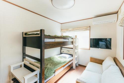 Palanda nebo palandy na pokoji v ubytování guesthouse SHIBAFU