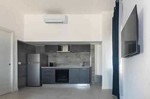 Dapur atau dapur kecil di LEMON SUITES APARTMENTS