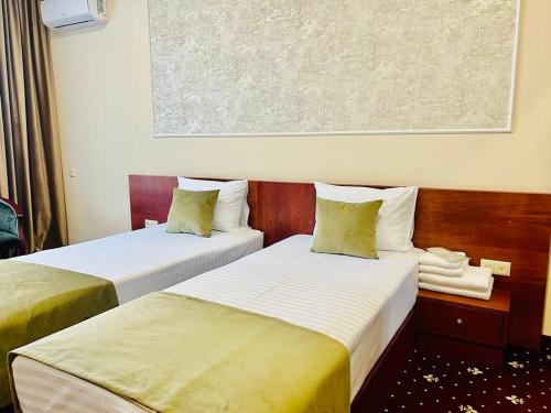 Grand Fortune Hotelにあるベッド