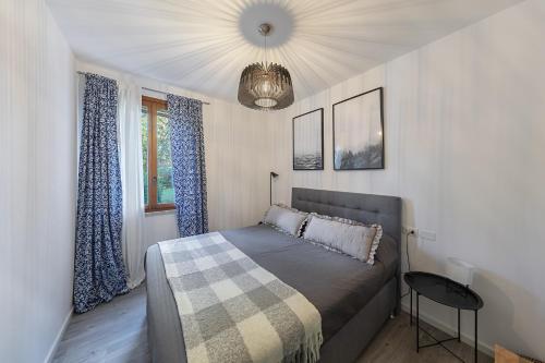 Ένα ή περισσότερα κρεβάτια σε δωμάτιο στο Le Giare PT-7 by Wonderful Italy