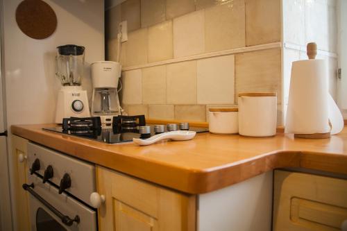a kitchen with a counter top with a blender at Holiday Home ART - Bol in Bol