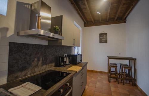 Kuchyň nebo kuchyňský kout v ubytování Le gite du chateau 2