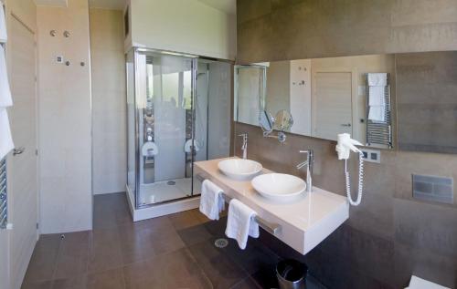 Ett badrum på Hotel Asturias