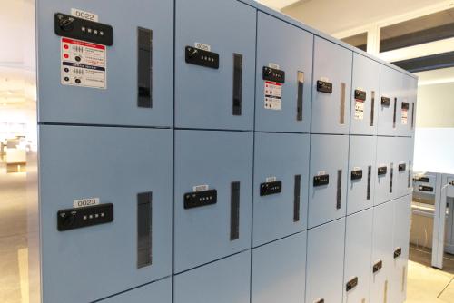 a row of lockers in a room at Toyoko Inn Tokyo Haneda Airport No.2 in Tokyo