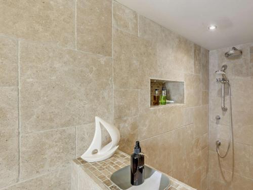 a bathroom with a shower and a sink at 2 Bed in Nidderdale G0156 in Hampsthwaite