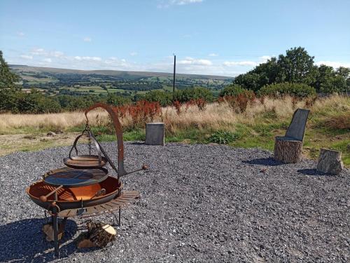 a metal object sitting on top of a pile of gravel at 5 bed in Brynteg 75907 in Llanwenog