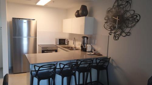 Η κουζίνα ή μικρή κουζίνα στο JTower Royal Suites - Alefimmoed