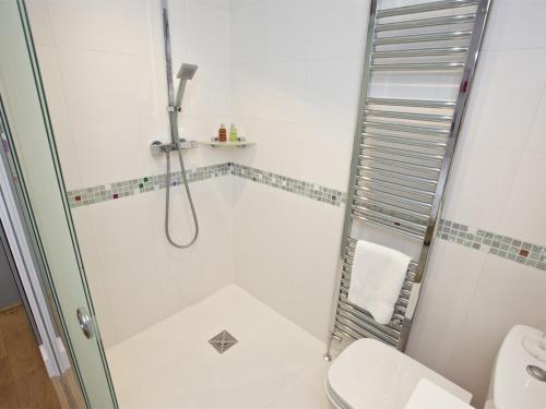 a bathroom with a shower and a toilet at 1 Bed in Richmond G0180 in Richmond
