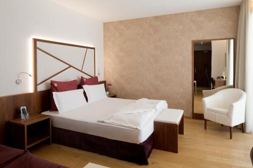 Postel nebo postele na pokoji v ubytování Hotel Campagnola
