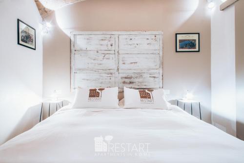 Cama o camas de una habitación en Restart Accommodations Rosa