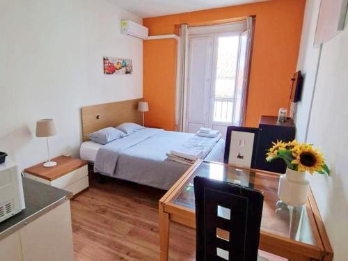 Vuode tai vuoteita majoituspaikassa Apartamentos TravelBudget Gran Vía