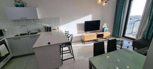 Η κουζίνα ή μικρή κουζίνα στο JTower Royal Suites - Alefimmoed