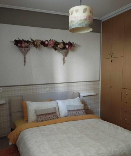Ένα ή περισσότερα κρεβάτια σε δωμάτιο στο 22 La Maisonette