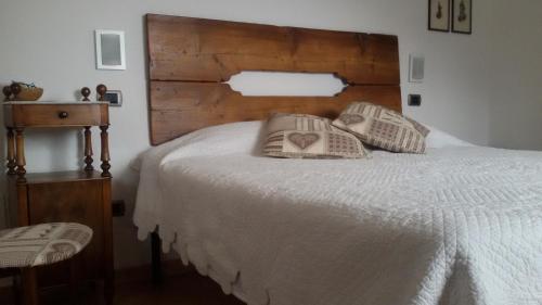 Llit o llits en una habitació de Lo Verdzé di Torgnon