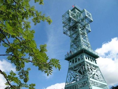 a tall tower with a cross on top of it at Urlaub-in-Stolberg-FeWo-EG in Stolberg i. Harz