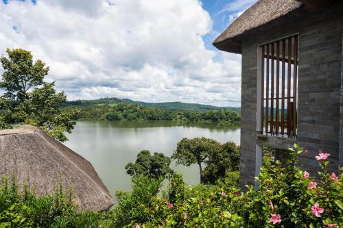 a view of a lake from a building at Tabebuia Spa and Safari Resort in Fort Portal