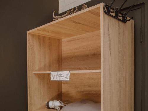 a wooden shelf with a sign that says my way at Die Moerbeiboom in Bloemfontein