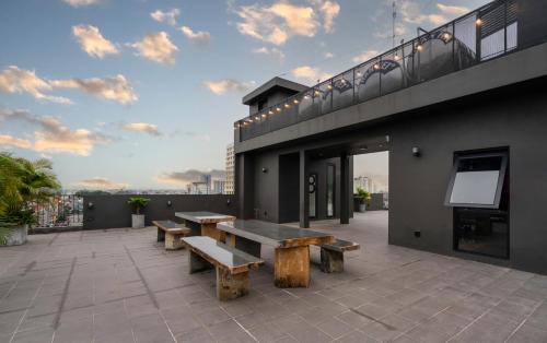 a group of benches on the roof of a building at Linn Hotel Bac Giang in Bắc Giang