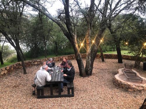 a group of people playing a game of chess at Schoemanshof in Potchefstroom