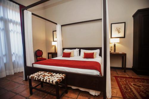 Postel nebo postele na pokoji v ubytování Legado Mitico Salta Hotel Boutique