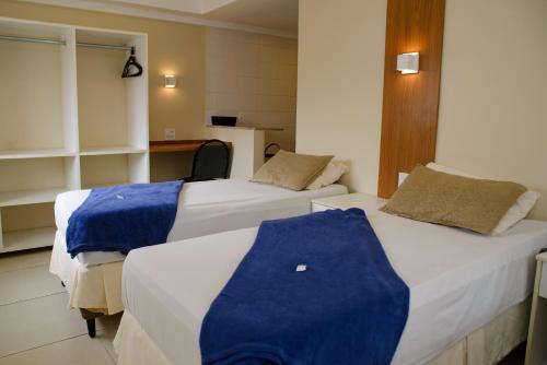 Katil atau katil-katil dalam bilik di Hotel Cantareira