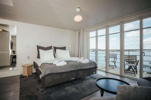 Postel nebo postele na pokoji v ubytování Gullmarsstrand Hotell & Konferens