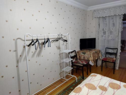 Postel nebo postele na pokoji v ubytování Бабушкин уют в РУСТАВИ