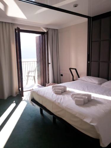 Postel nebo postele na pokoji v ubytování Hotel Celis