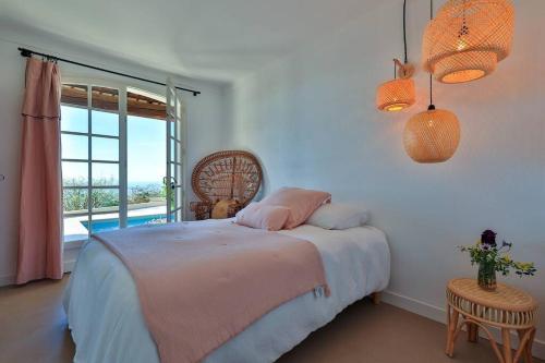 Posteľ alebo postele v izbe v ubytovaní Villa avec vue mer panoramique