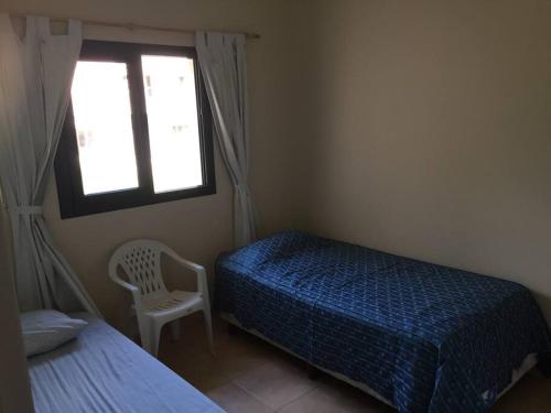 Postel nebo postele na pokoji v ubytování CASA DUPLEX CON PILETA/QUINCHO