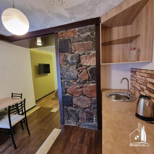 Kuchyň nebo kuchyňský kout v ubytování River House Boutique Hotel