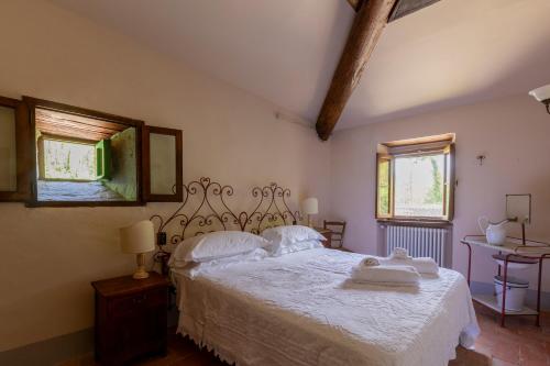 Een bed of bedden in een kamer bij Agriturismo Molinvecchio