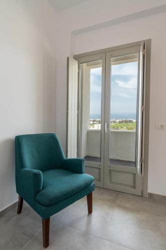 Coin salon dans l'établissement Maeva Suites Santorini
