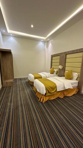 Tempat tidur dalam kamar di خيالى2