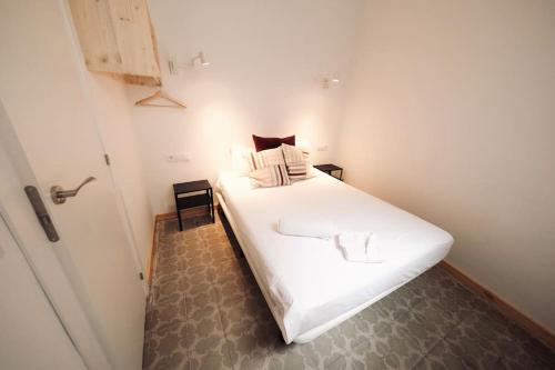 En eller flere senge i et værelse på Barcelona - Eixample Entresuelo