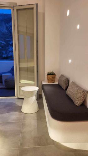 Coin salon dans l'établissement Maeva Suites Santorini