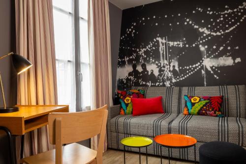 Ein Sitzbereich in der Unterkunft Hotel L’Antoine