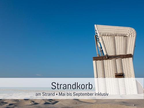 a rendering of a wicker building on the beach at Ferienhaus Küstenzauber Kalifornien - mit Hund - komplett eingezäunter großer Garten - Sauna und Kamin - im Sommer Strandkorb inklusive in Schönberg in Holstein