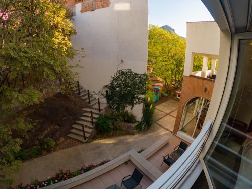 a view from the balcony of a house with stairs at La Cañada in Guanajuato