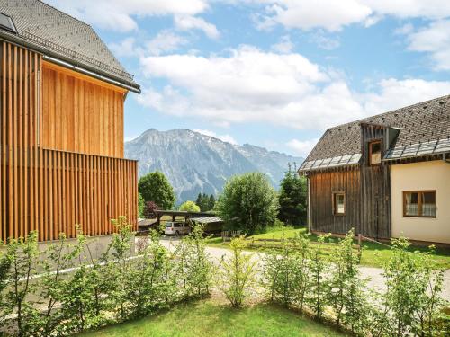 a view of the mountains from the courtyard of a house at Mountain Lovers Three by AA Holiday Homes in Tauplitz