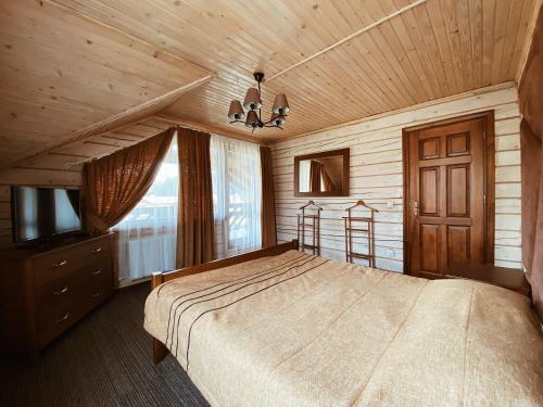 TAOR Karpaty Resort & Spaにあるベッド
