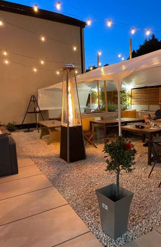 a patio with a light in the middle at The Green Inn in Goole
