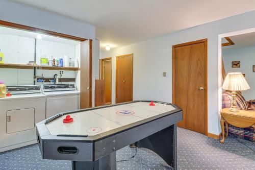 a ping pong table in the middle of a kitchen at 6 Mi to Jack Frost Ski Resort Family Home with Deck in Blakeslee