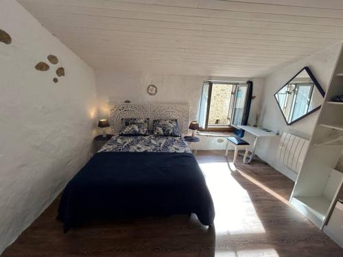 Ένα ή περισσότερα κρεβάτια σε δωμάτιο στο Charmant duplex 2 chambres/terrasse