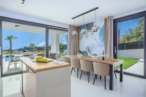 Deluxe villa with heated pool, whirpool, sea view near beautiful beach III - by Traveler tourist agency Krk ID 2402