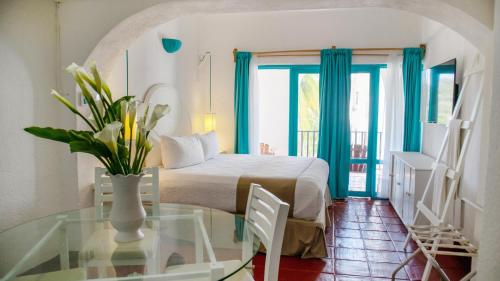 Un ou plusieurs lits dans un hébergement de l'établissement Hotel Marina Resort & Beach Club