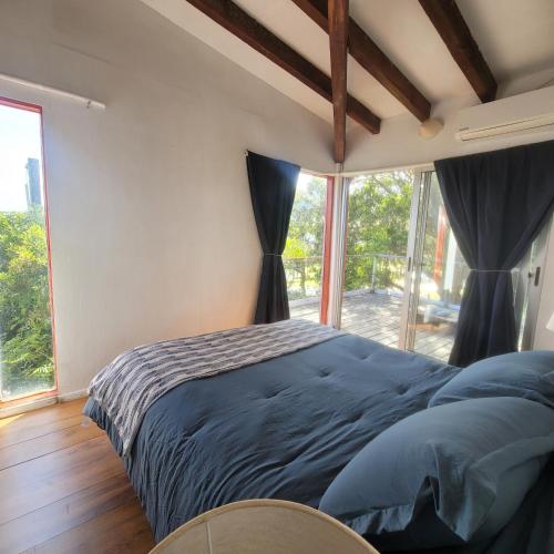 Ένα ή περισσότερα κρεβάτια σε δωμάτιο στο Casa Encantada Guest House