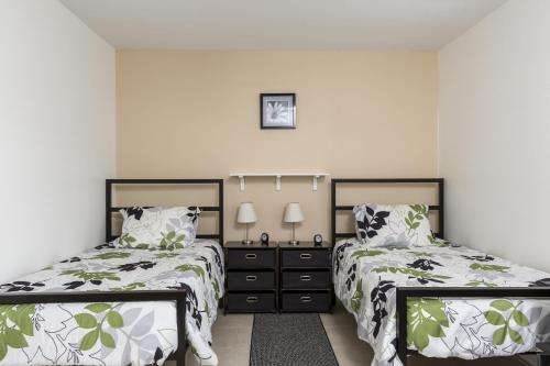Ένα ή περισσότερα κρεβάτια σε δωμάτιο στο Addy by the Lake