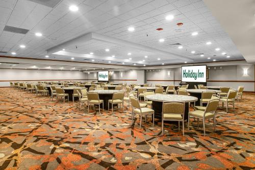 a large banquet hall with tables and chairs in a room at Holiday Inn San Francisco - Golden Gateway newly renovated with No Resort Fee in San Francisco