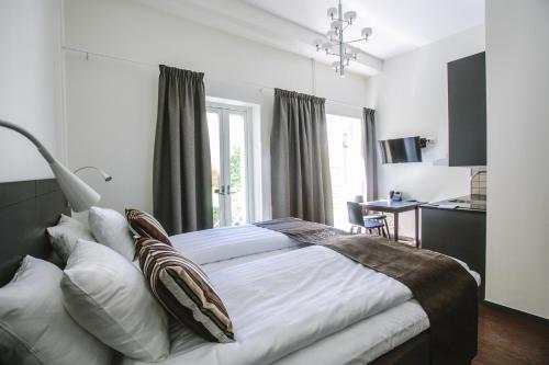 Ένα ή περισσότερα κρεβάτια σε δωμάτιο στο Best Western Plus Hotell Nordic Lund